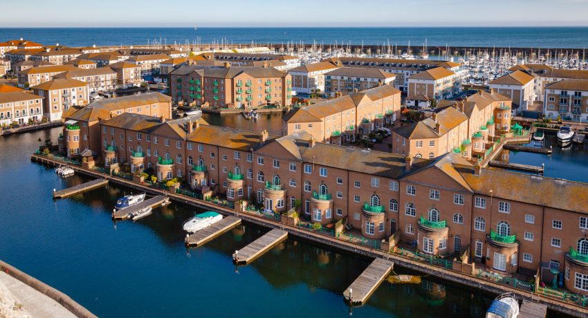 BRIGHTON, UK - JUN 5, 2013: Aerial view of artificial Brighton Marina, a popular housing and leisure complex with yachting marina